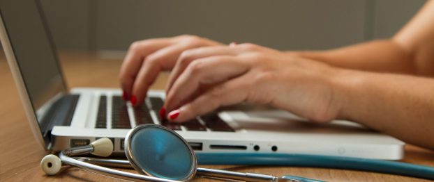 stethoscope and a laptop